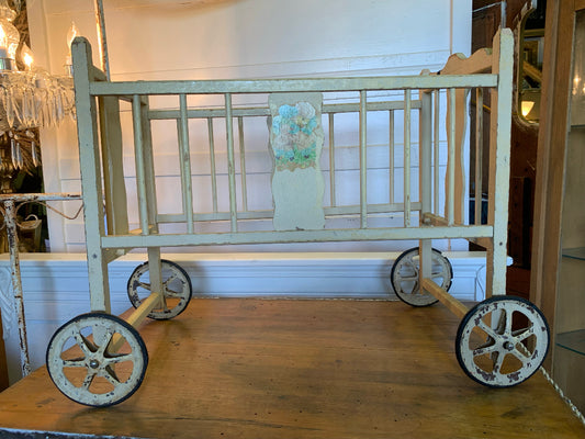 wht rolling doll bed